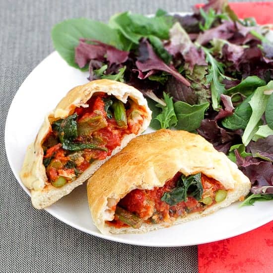 calzones with hot italian chicken sausage, asparagus, and spinach