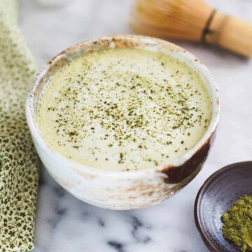 white chocolate matcha in white pottery cub