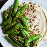 Harissa Snap Peas with Cashew Hummus & Sunflower Seed Za'atar