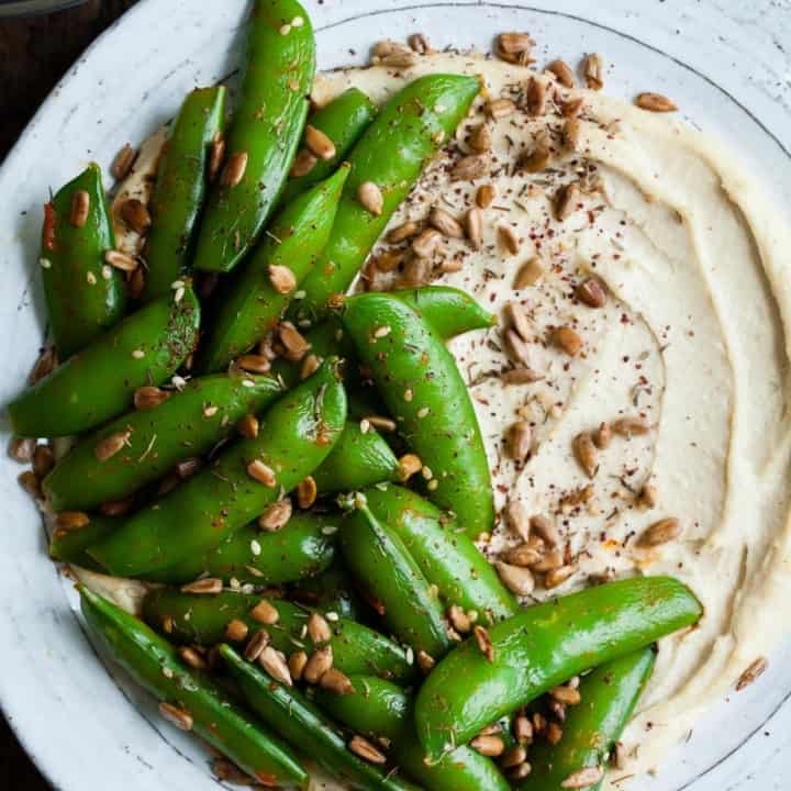 Harissa Snap Peas with Cashew Hummus & Sunflower Seed Za'atar