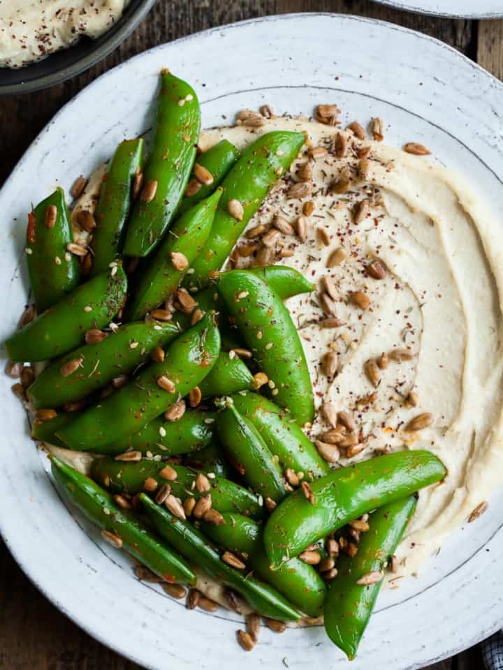 Harissa Snap Peas with Cashew Hummus & Sunflower Seed Za'atar