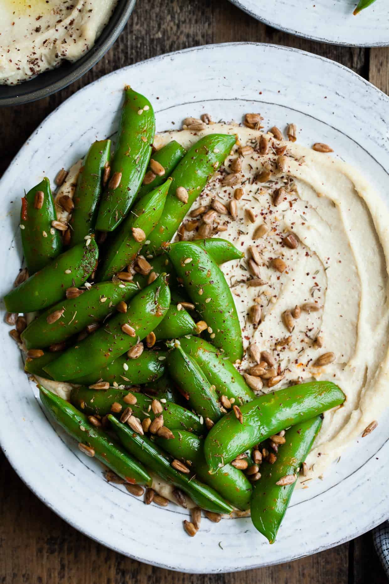 Harissa Snap Peas with Cashew Hummus & Sunflower Seed Za'atar