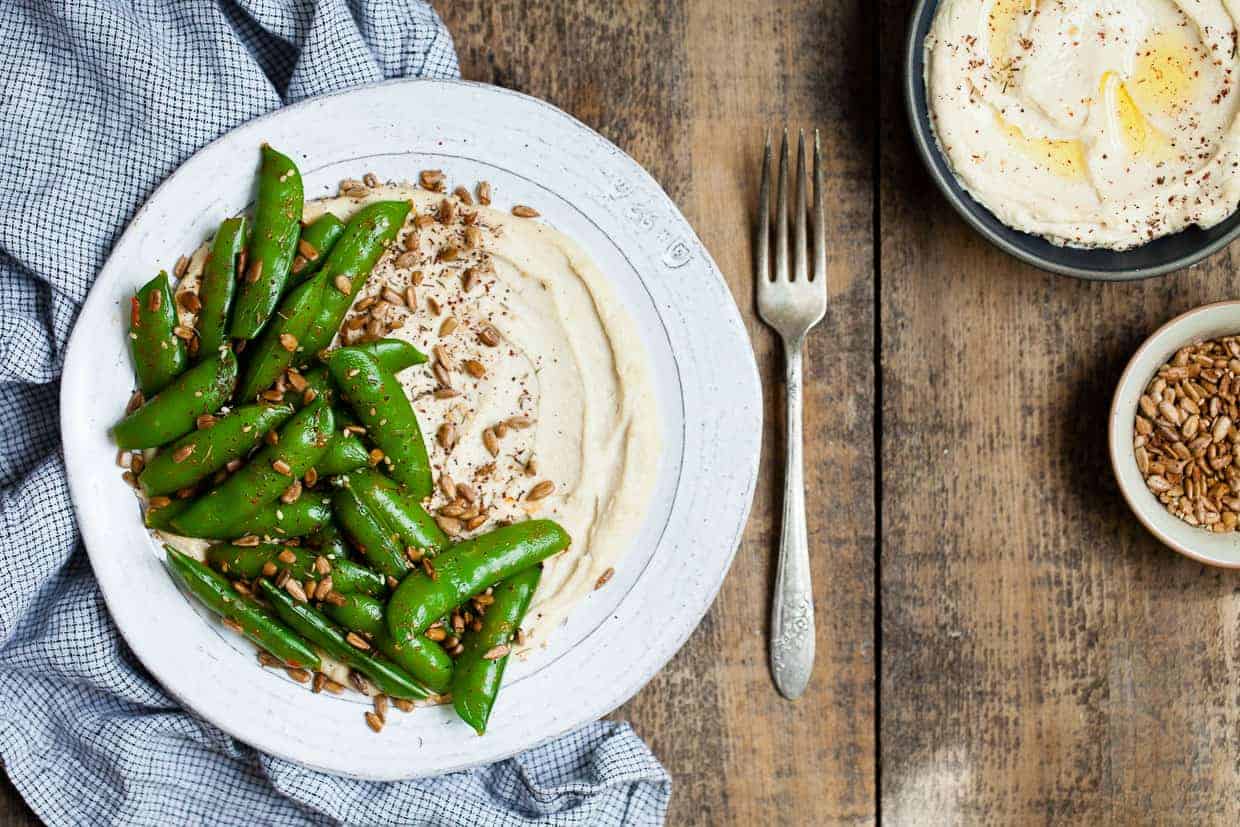 Harissa Snap Peas with Cashew Hummus & Sunflower Seed Za'atar