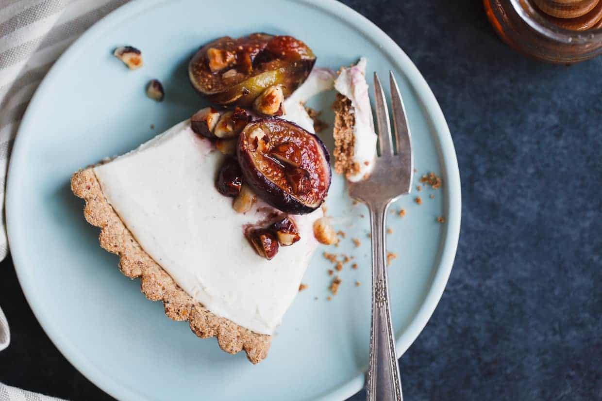 Ginger Goat Cheese Cheesecake with Roasted Figs and Hazelnuts