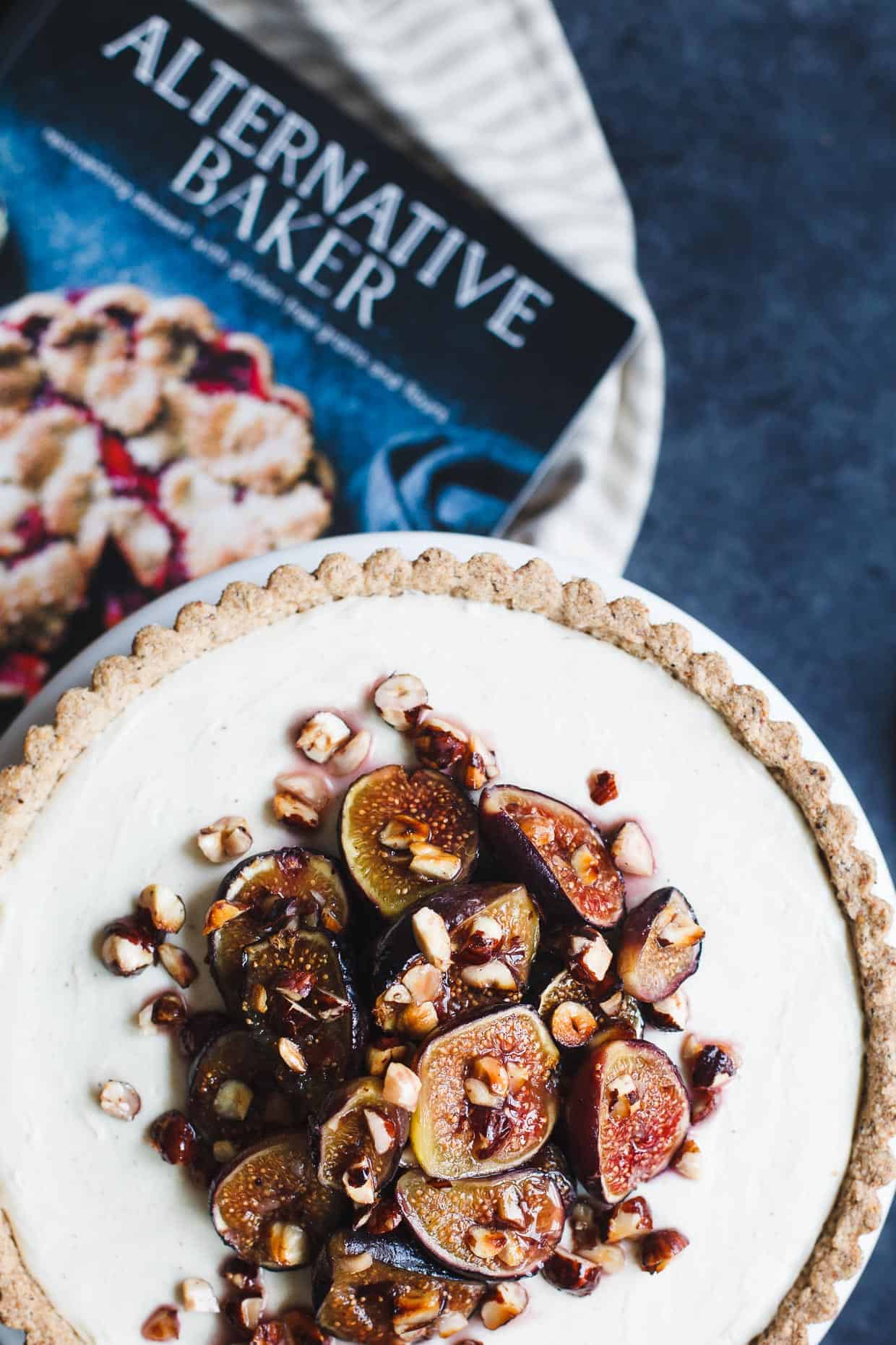 Ginger Goat Cheese Cheesecake with Roasted Figs and Hazelnuts