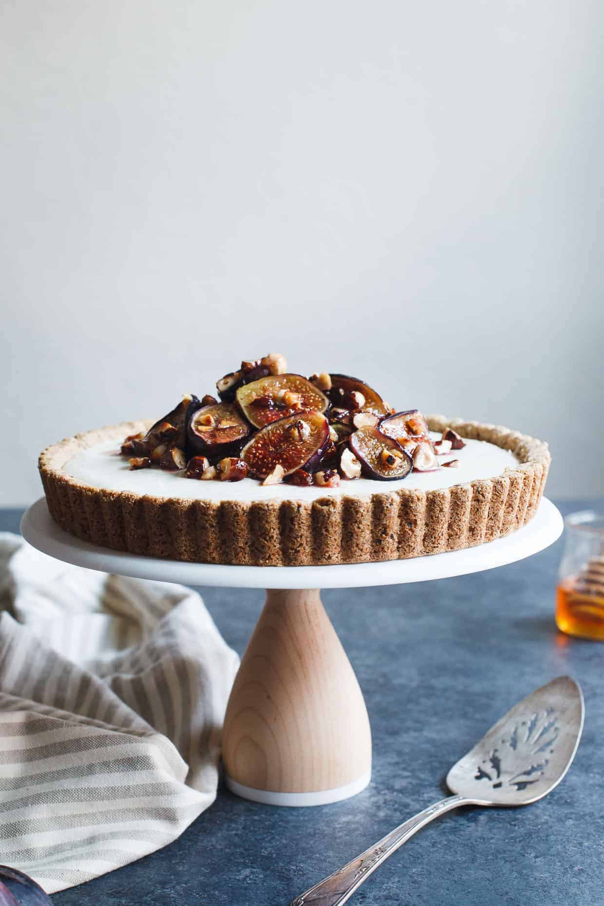 Ginger Goat Cheese Cheesecake with Roasted Figs and Hazelnuts