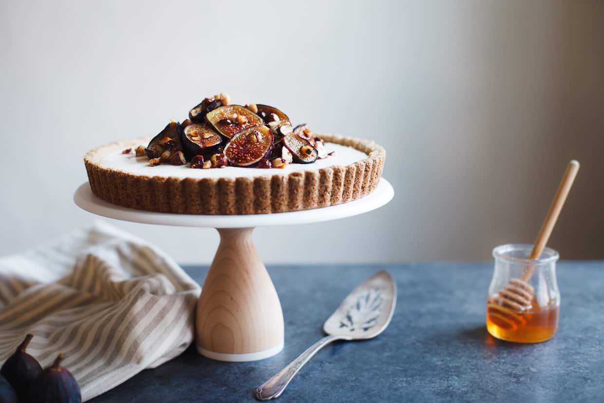 Ginger Goat Cheese Cheesecake with Roasted Figs and Hazelnuts