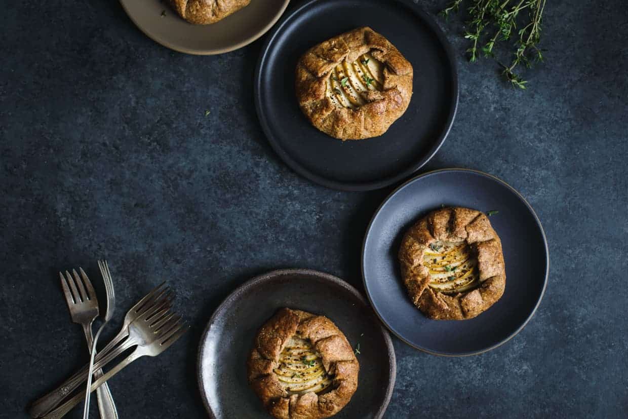 Apple, Cheddar, & Caramelized Onion Galettes with Gluten-Free Buckwheat Crust