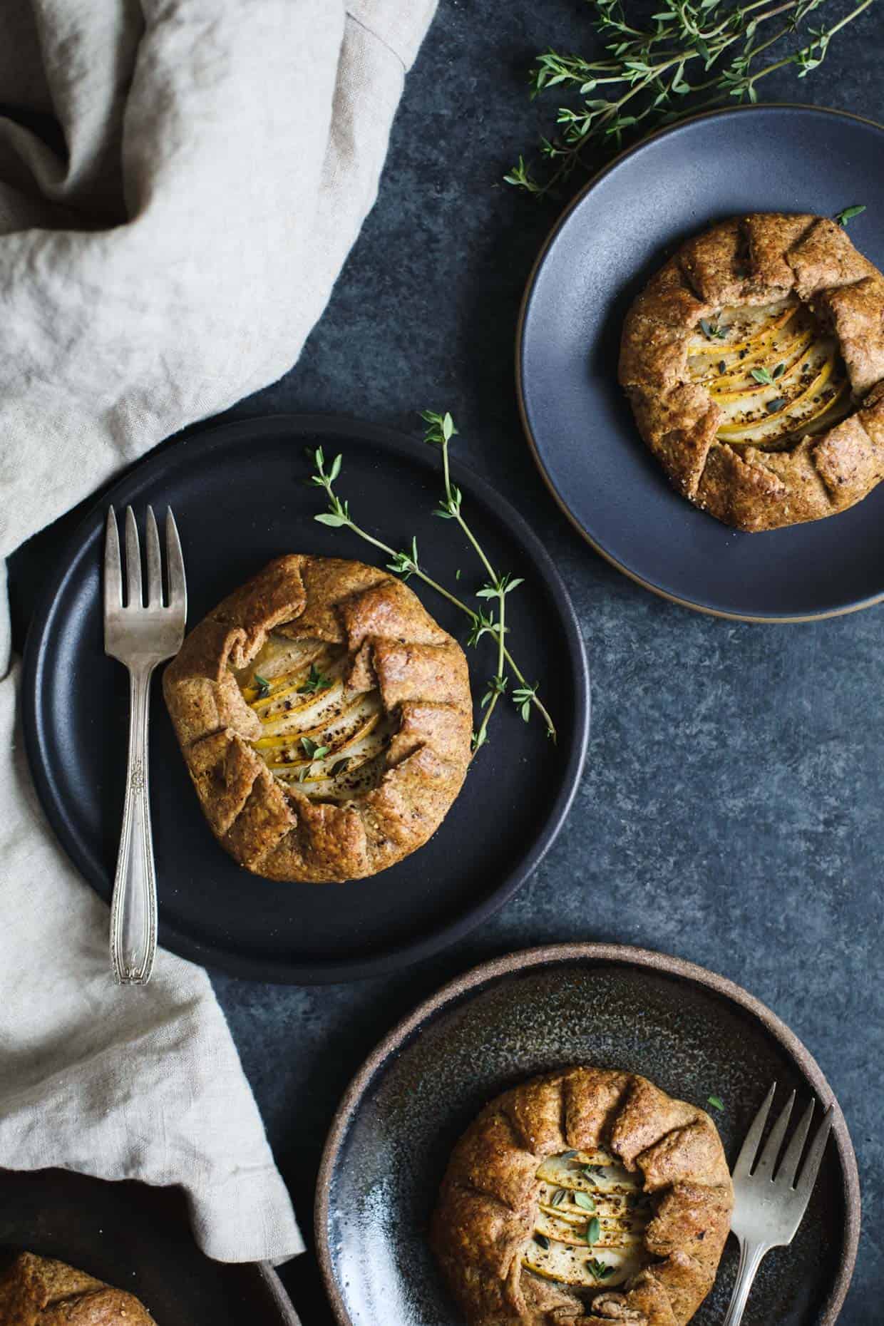 Apple, Cheddar, & Caramelized Onion Galettes with Gluten-Free Buckwheat Crust