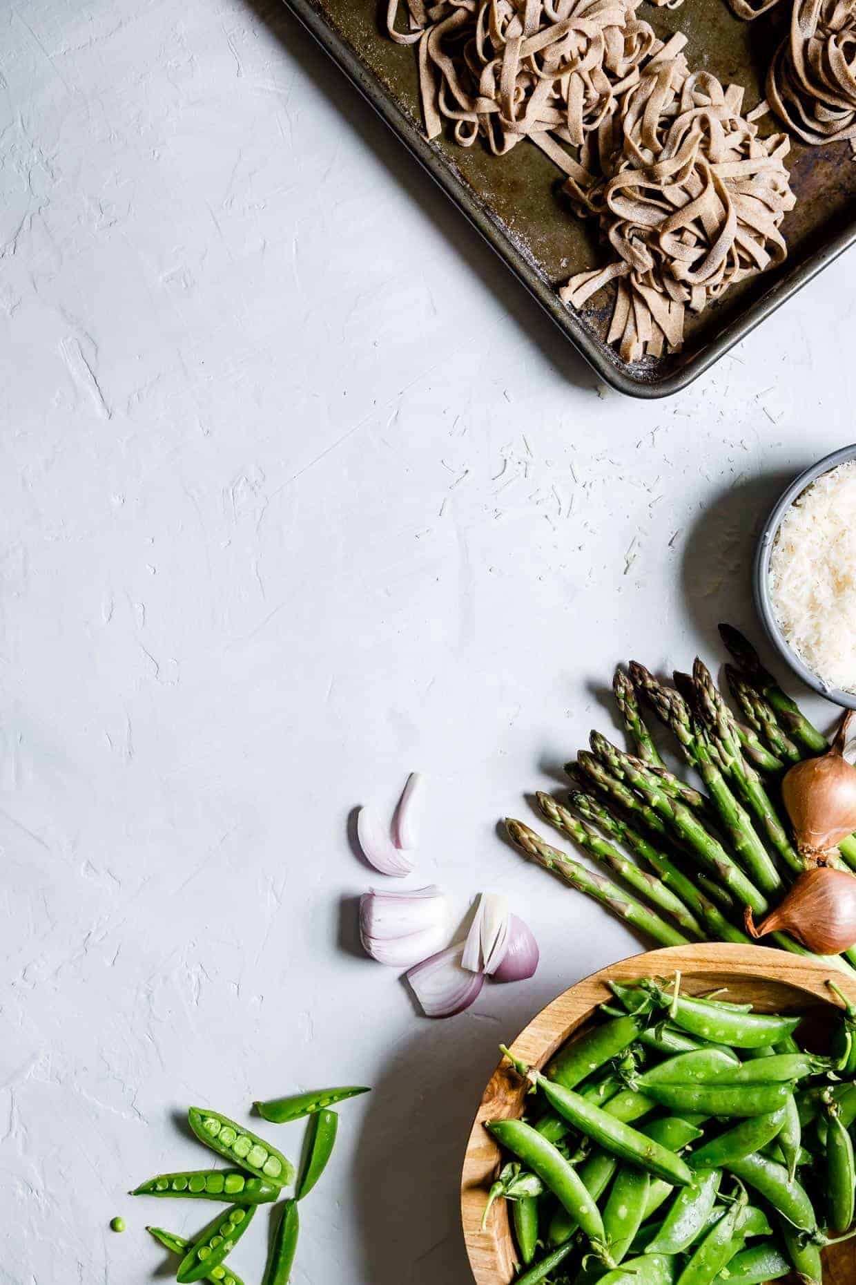 Almond Milk Fettuccine Alfredo with Spring Veggies & Herbs