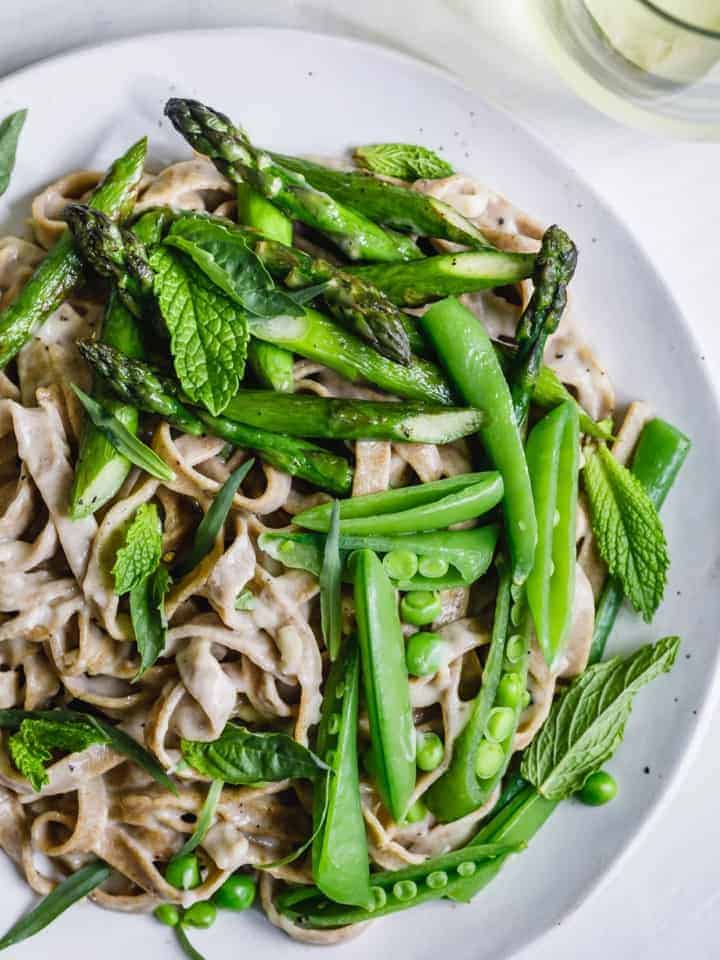 Almond Milk Fettuccine Alfredo with Spring Veggies & Herbs