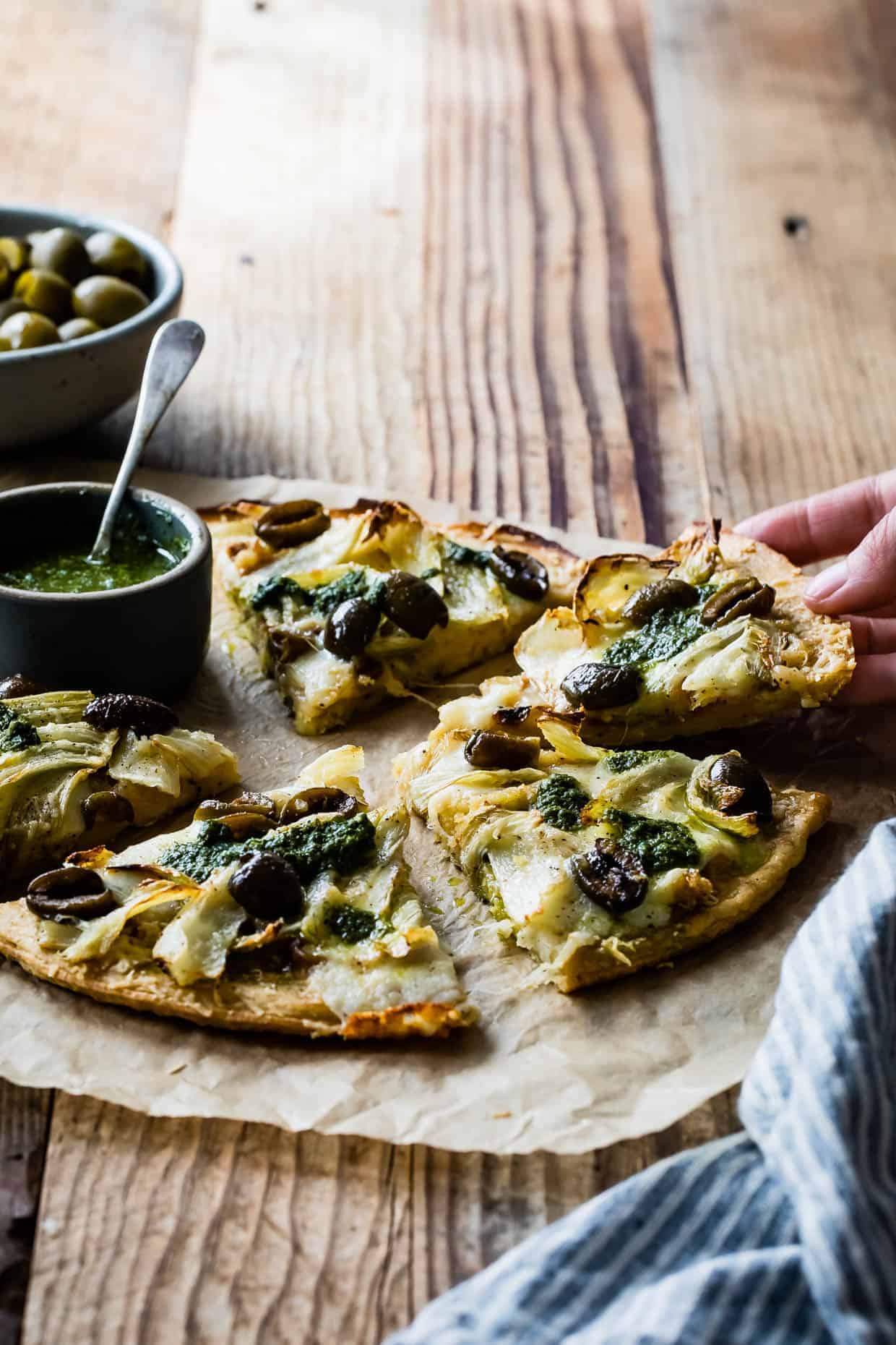 Roasted Fennel & Garlic Socca Flatbread with Olives and Mint Parsley Oil