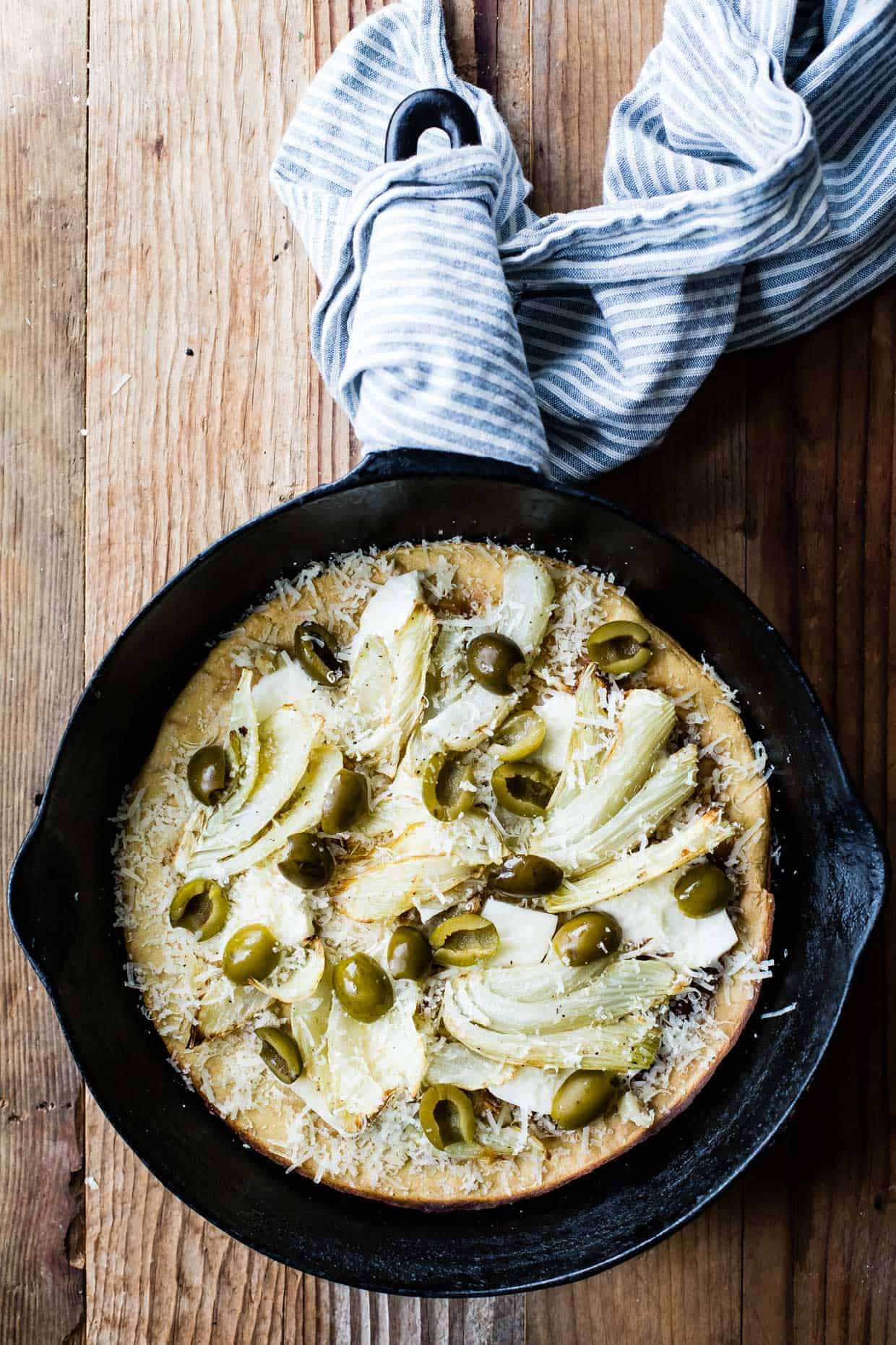 Roasted Fennel & Garlic Socca Flatbread with Olives and Mint Parsley Oil