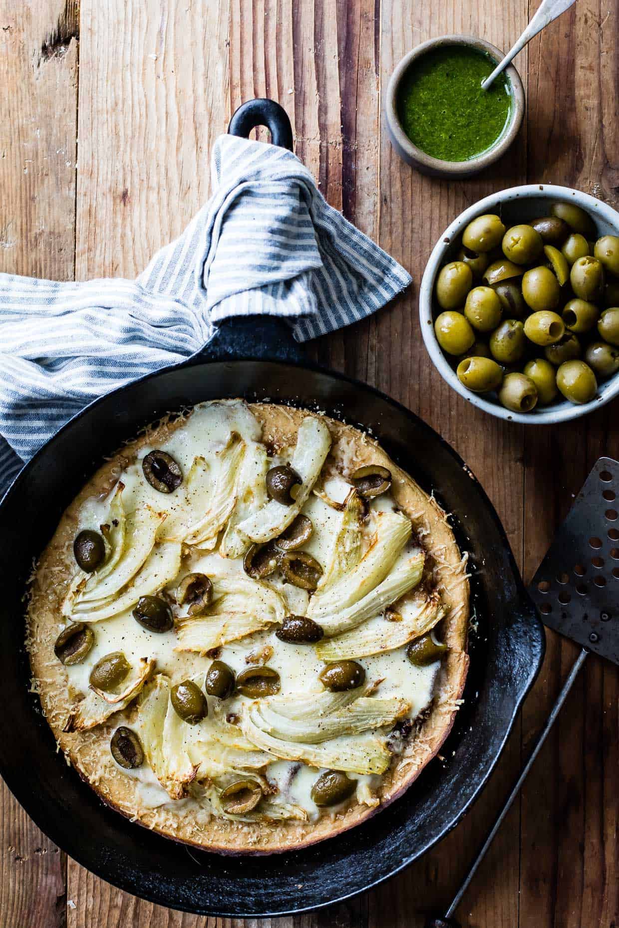 Roasted Fennel & Garlic Socca Flatbread with Olives and Mint Parsley Oil