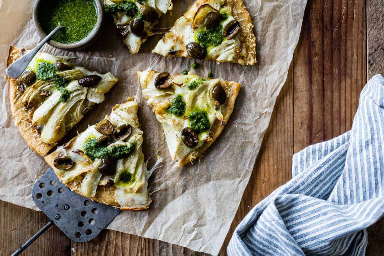 Roasted Fennel & Garlic Socca Flatbread with Olives and Mint Parsley Oil