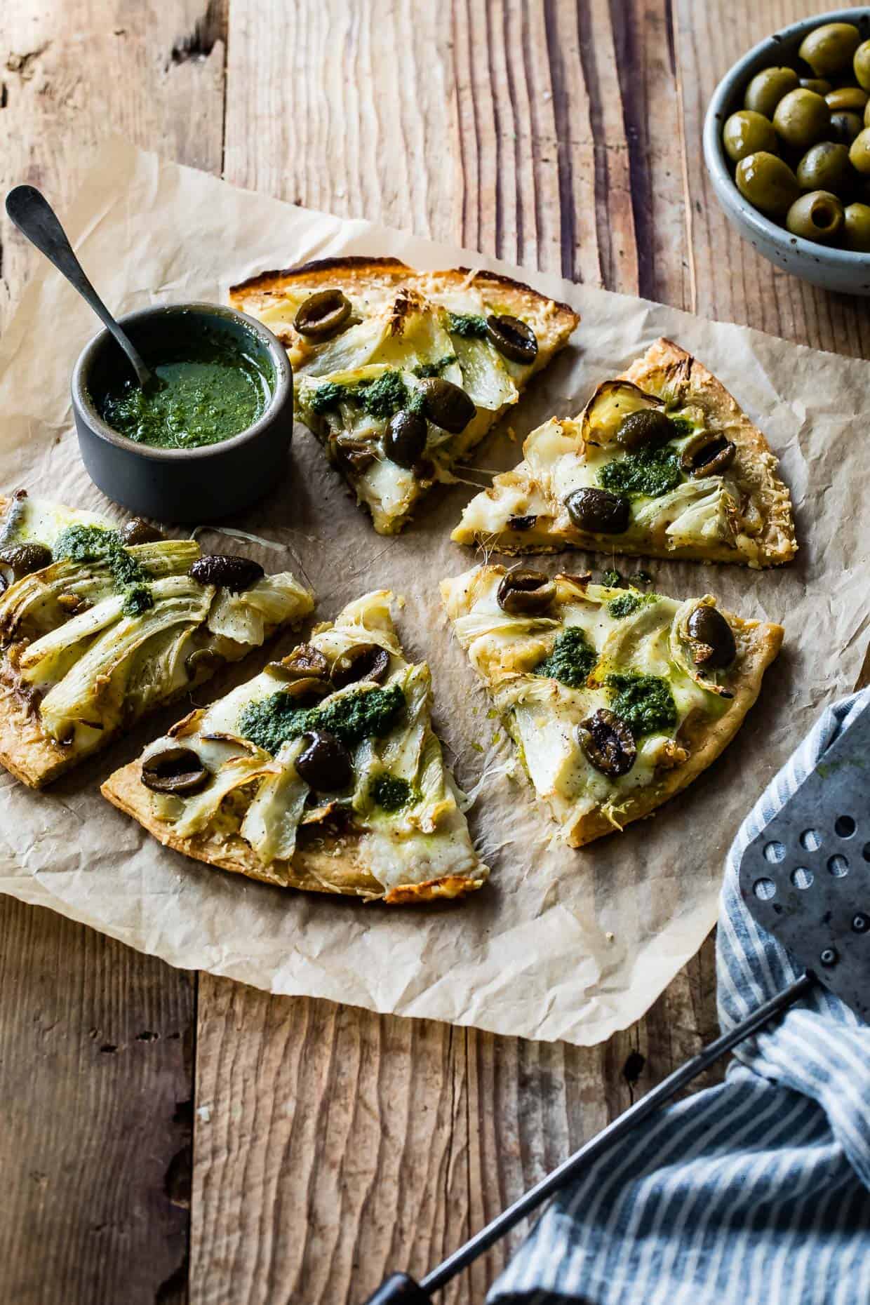 Roasted Fennel & Garlic Socca Flatbread with Olives and Mint Parsley Oil