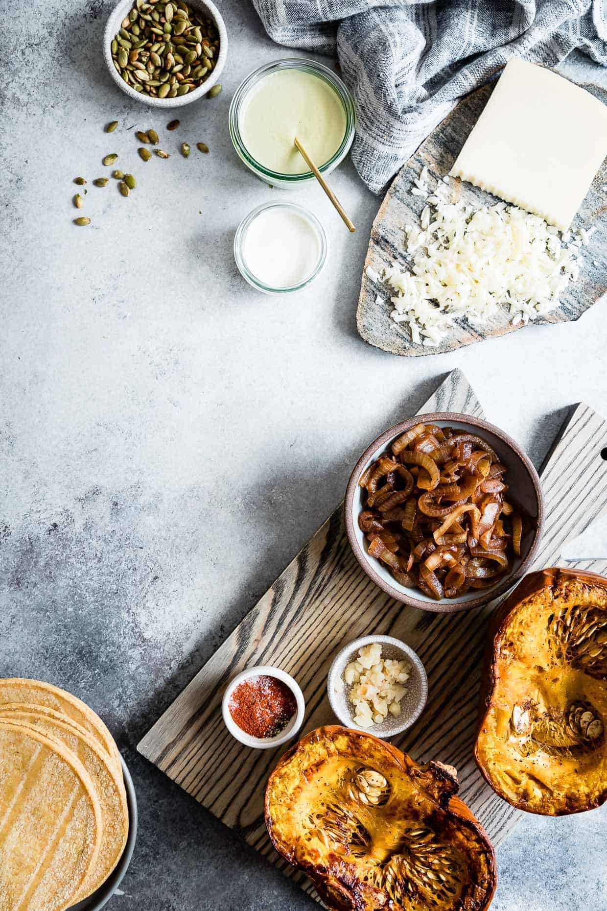 Cheesy Pumpkin Taquitos with Roasted Jalapeno Pepita Crema