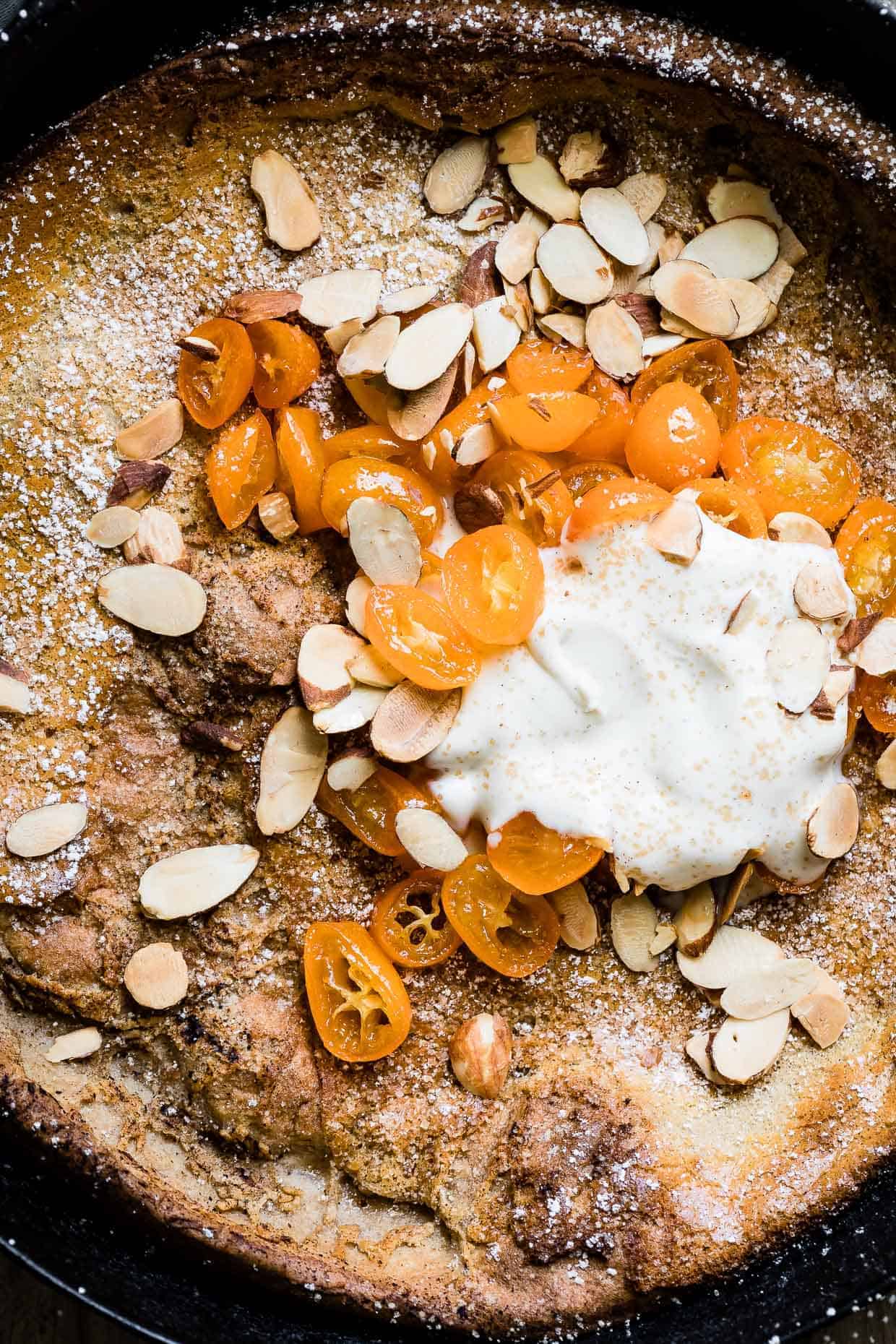 Gluten-Free Almond Dutch Baby with Honeyed Kumquats and Vanilla Creme Fraiche