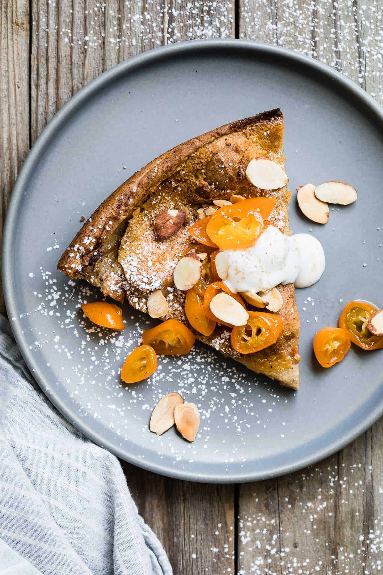 Gluten-Free Almond Dutch Baby with Honeyed Kumquats and Vanilla Creme Fraiche