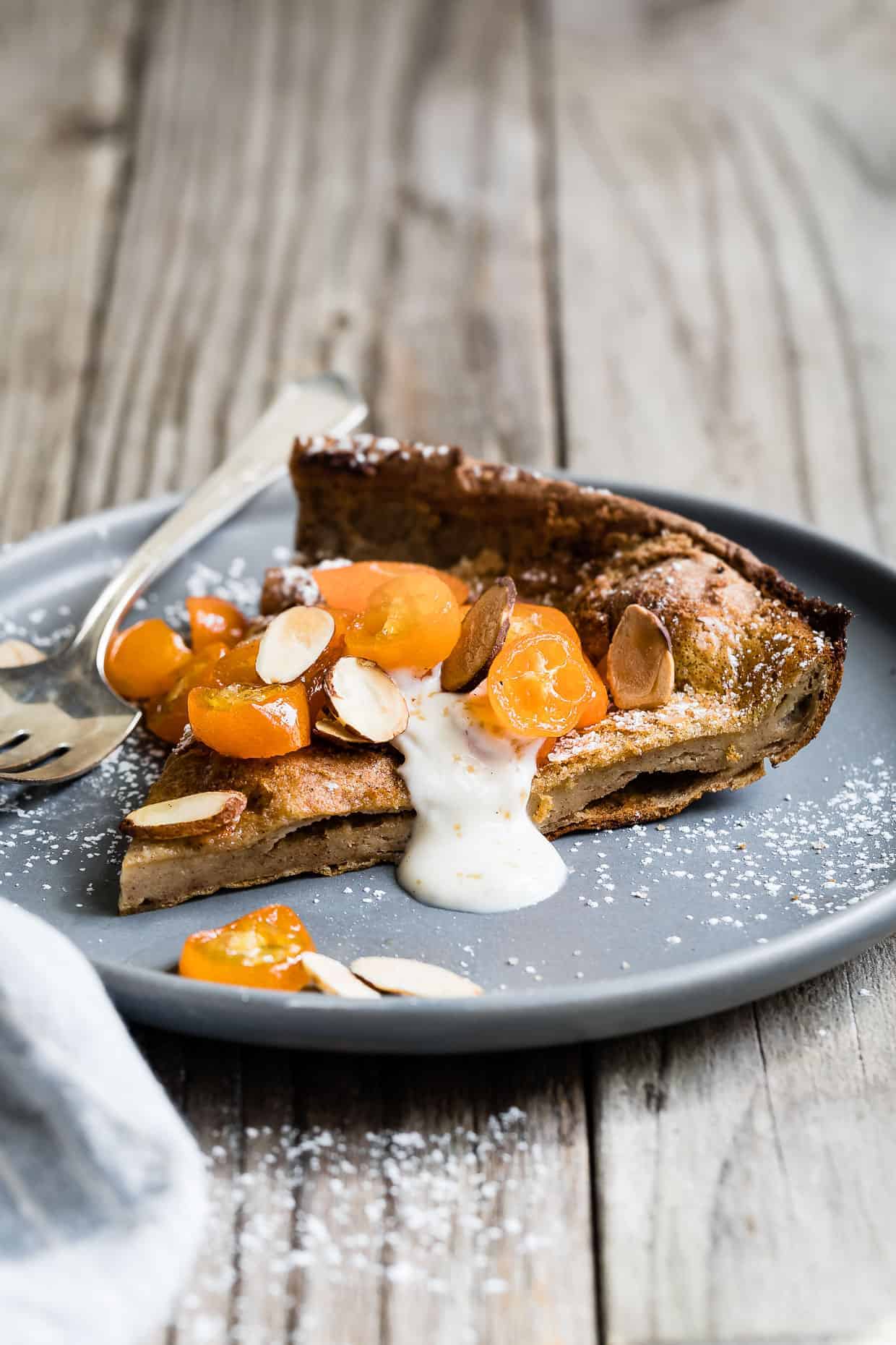 Gluten-Free Almond Dutch Baby with Honeyed Kumquats and Vanilla Creme Fraiche