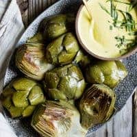 White Wine Braised Artichokes with Cashew Mandarin Tarragon Aioli