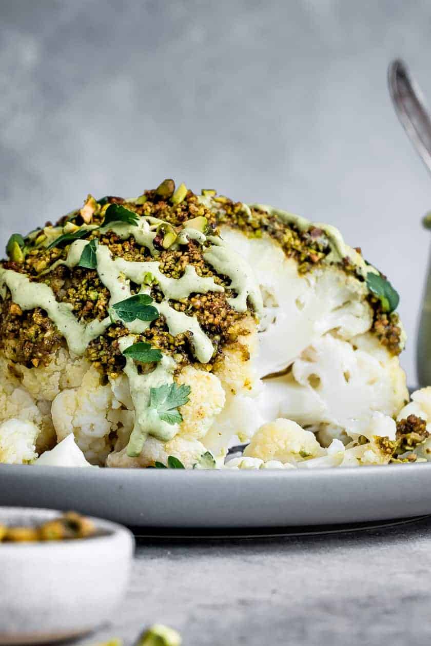 Pistachio-Crusted Whole Roasted Cauliflower with Pistachio Cream SaucePistachio-Crusted Whole Roasted Cauliflower with Pistachio Cream Sauce