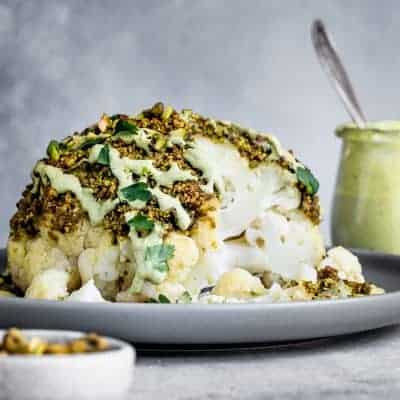 Pistachio-Crusted Whole Roasted Cauliflower with Pistachio Cream SaucePistachio-Crusted Whole Roasted Cauliflower with Pistachio Cream Sauce
