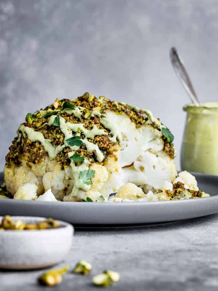 Pistachio-Crusted Whole Roasted Cauliflower with Pistachio Cream SaucePistachio-Crusted Whole Roasted Cauliflower with Pistachio Cream Sauce