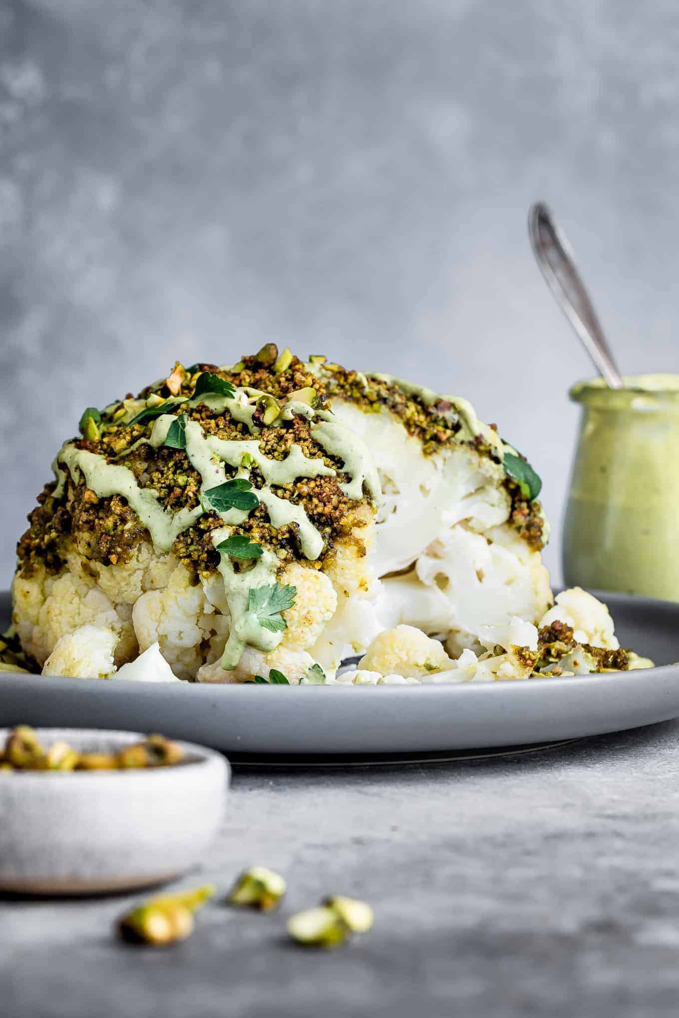 Pistachio-Crusted Whole Roasted Cauliflower with Pistachio Cream SaucePistachio-Crusted Whole Roasted Cauliflower with Pistachio Cream Sauce