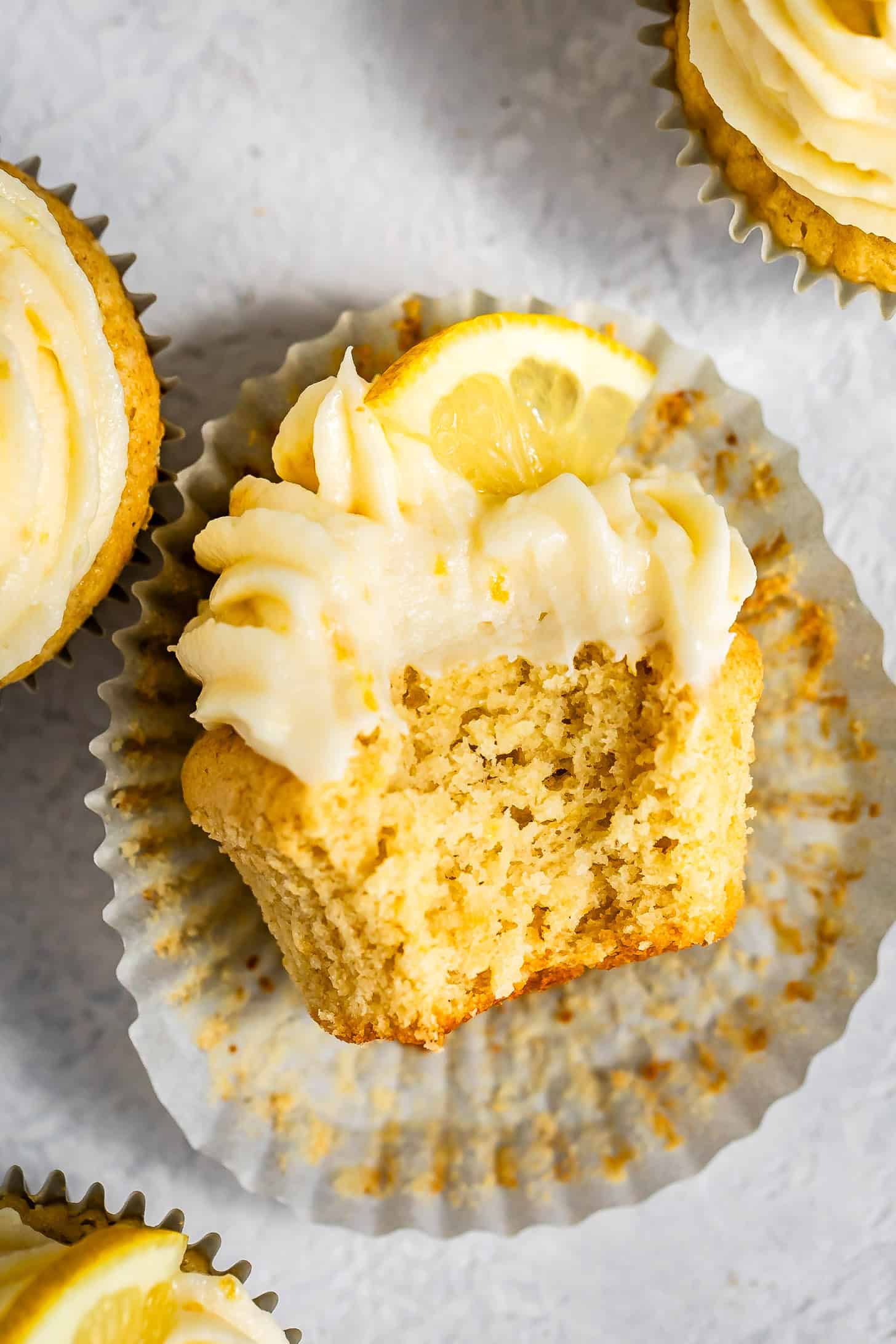 Overhead Bite of Gluten-Free Lemon Cupcake with Almond Flour