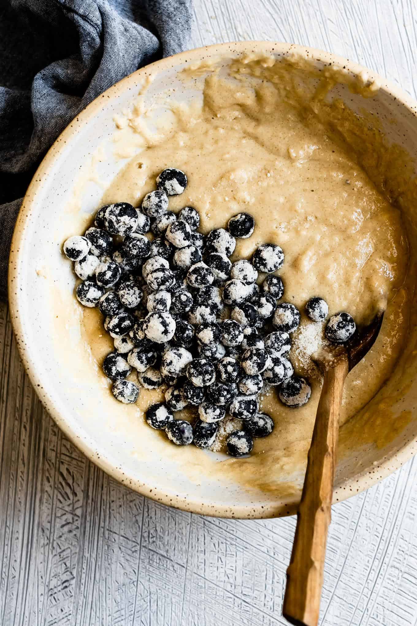 Tossing Blueberries in Flour for Healthy Gluten-Free Blueberry Muffins