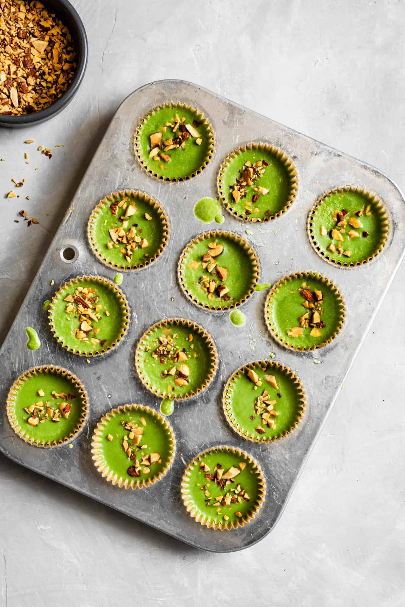 Chilled Coconut Matcha Almond Butter Cups in Mini Muffin Pan