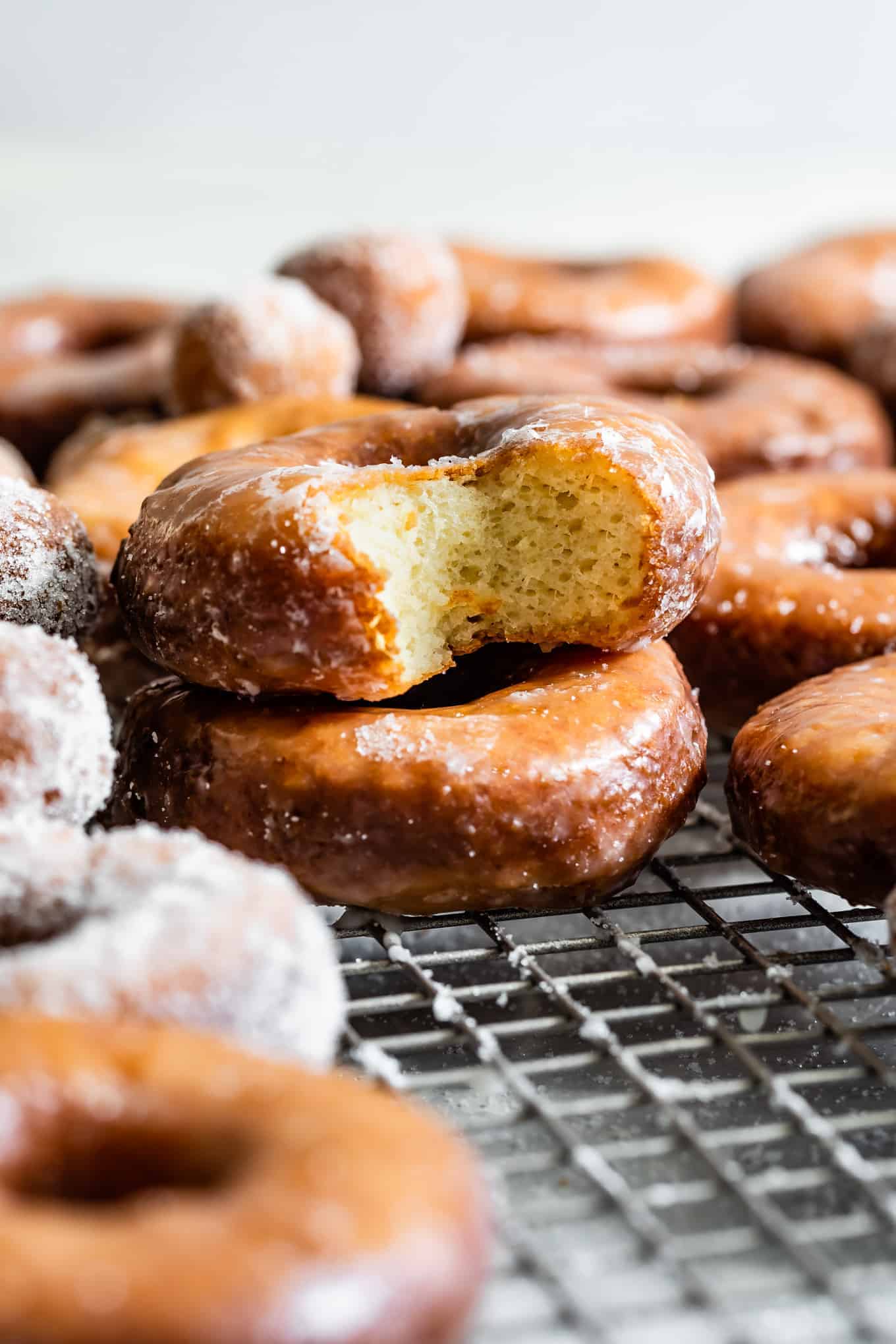 Bite of fried gluten-free yeast donut