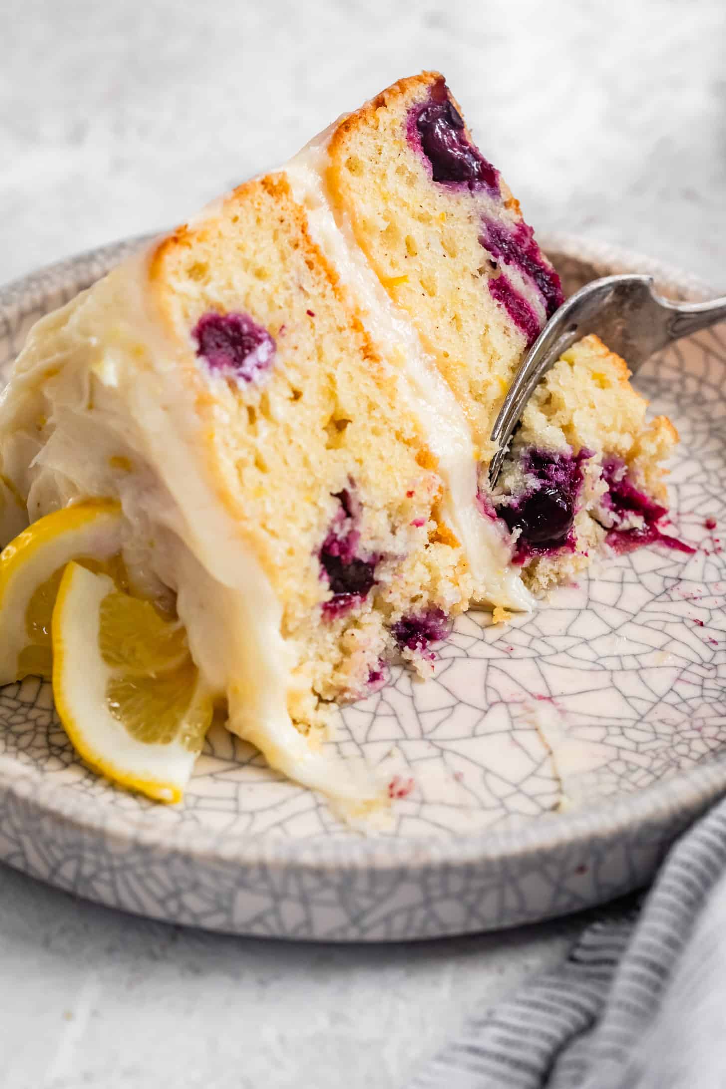 Bite our of Slice of Gluten-Free Lemon Blueberry Cake