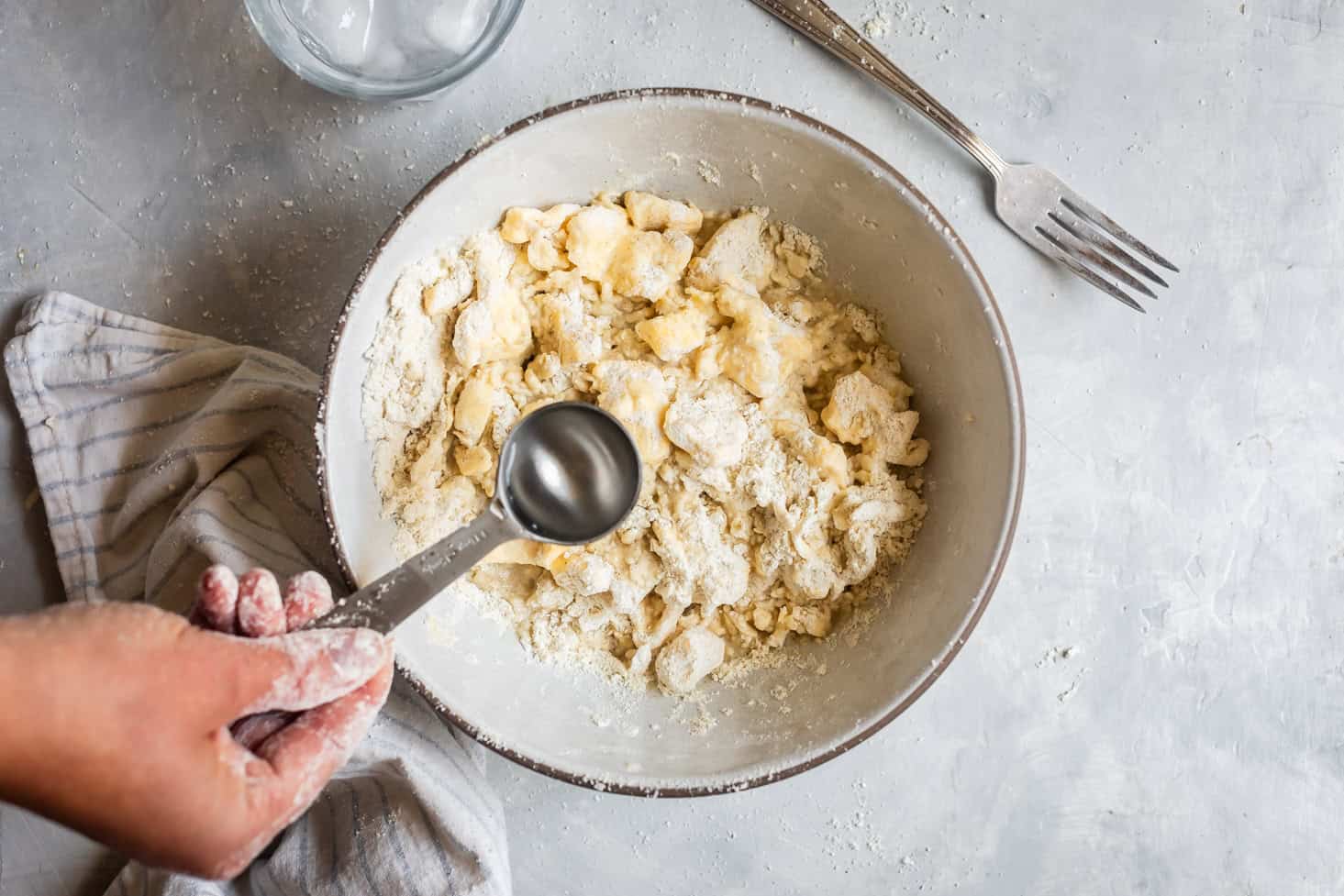 Drizzling Ice Water into Gluten-Free Pie Dough