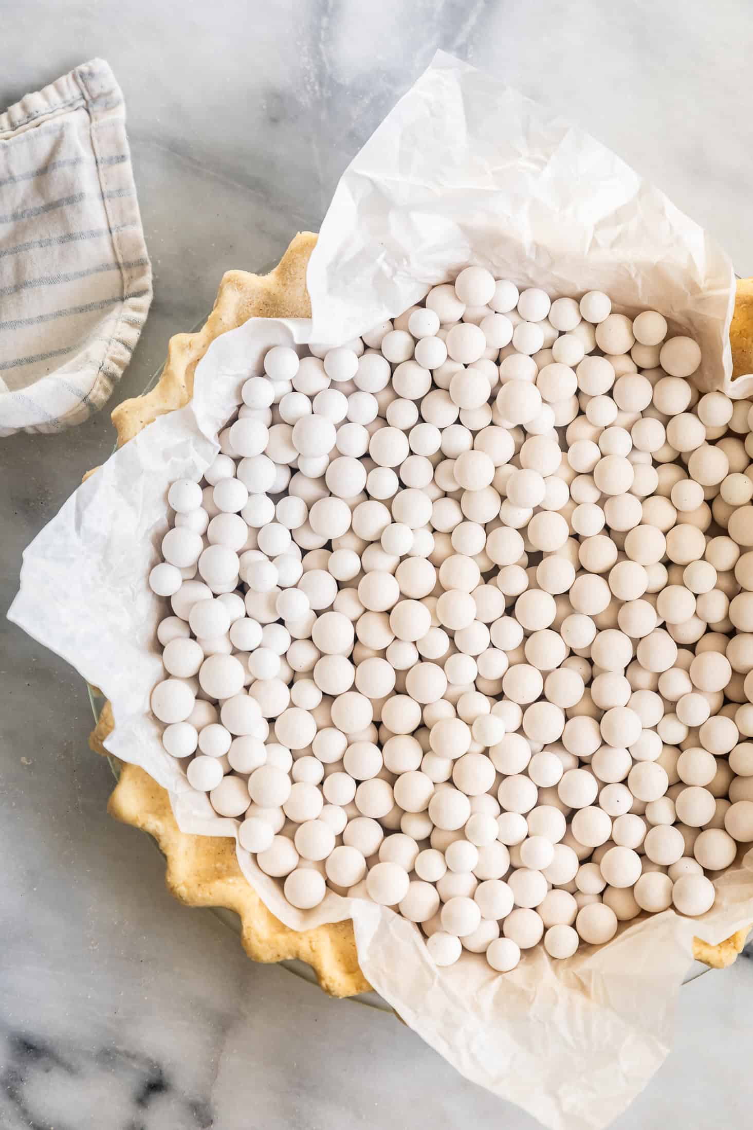 Filling Gluten-Free Pie Crust with Pie Weights for Blind Baking