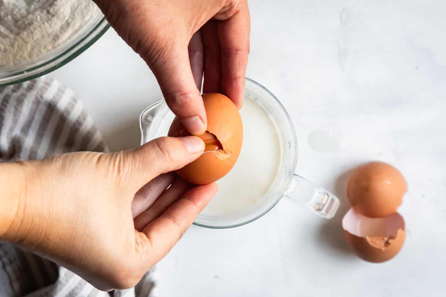 Cracking Egg for Mochi Waffles