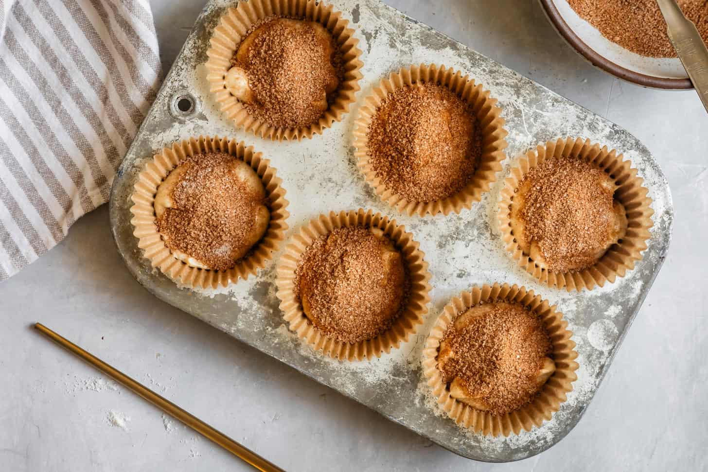 Step 9 Sprinkling Cinnamon Sugar for Cinnamon Swirl Cupcakes