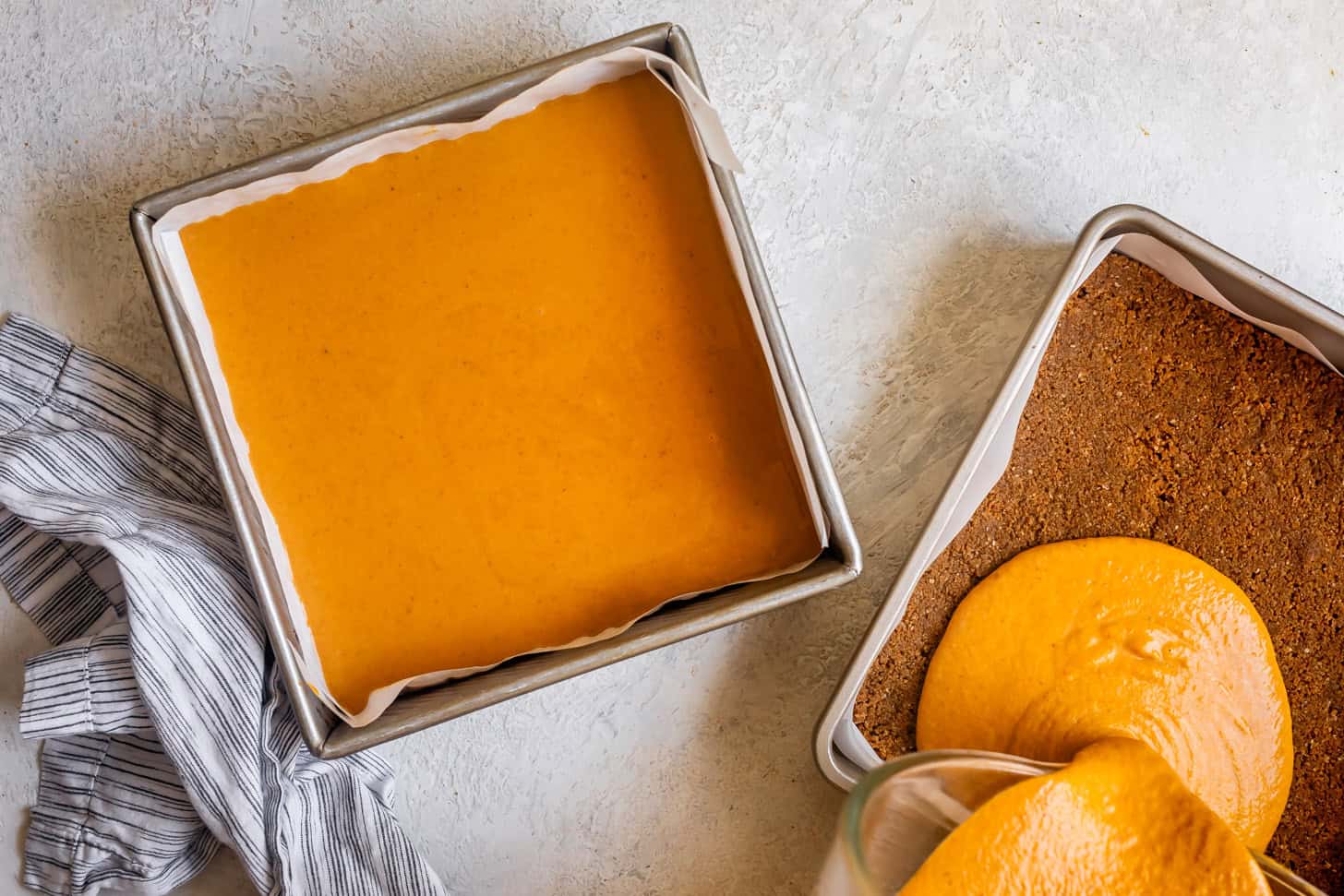 Pouring Pumpkin Pie Filling into Crust