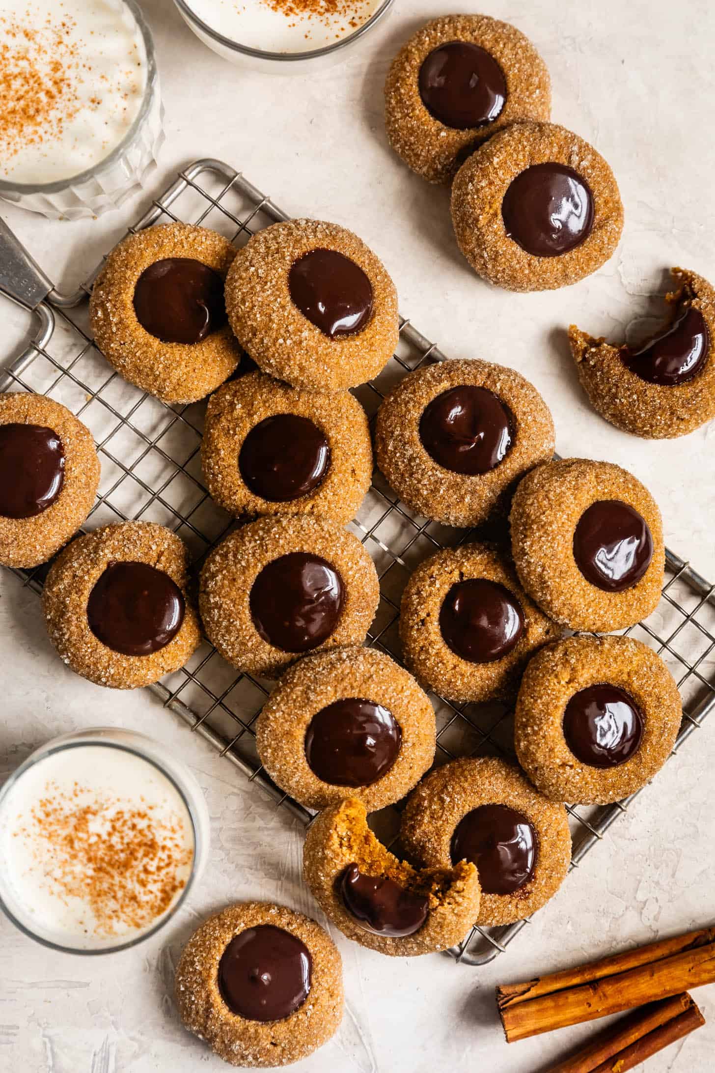 Gluten Free Gingerbread Thumbprint Cookies with Eggnog Ganache on Rack