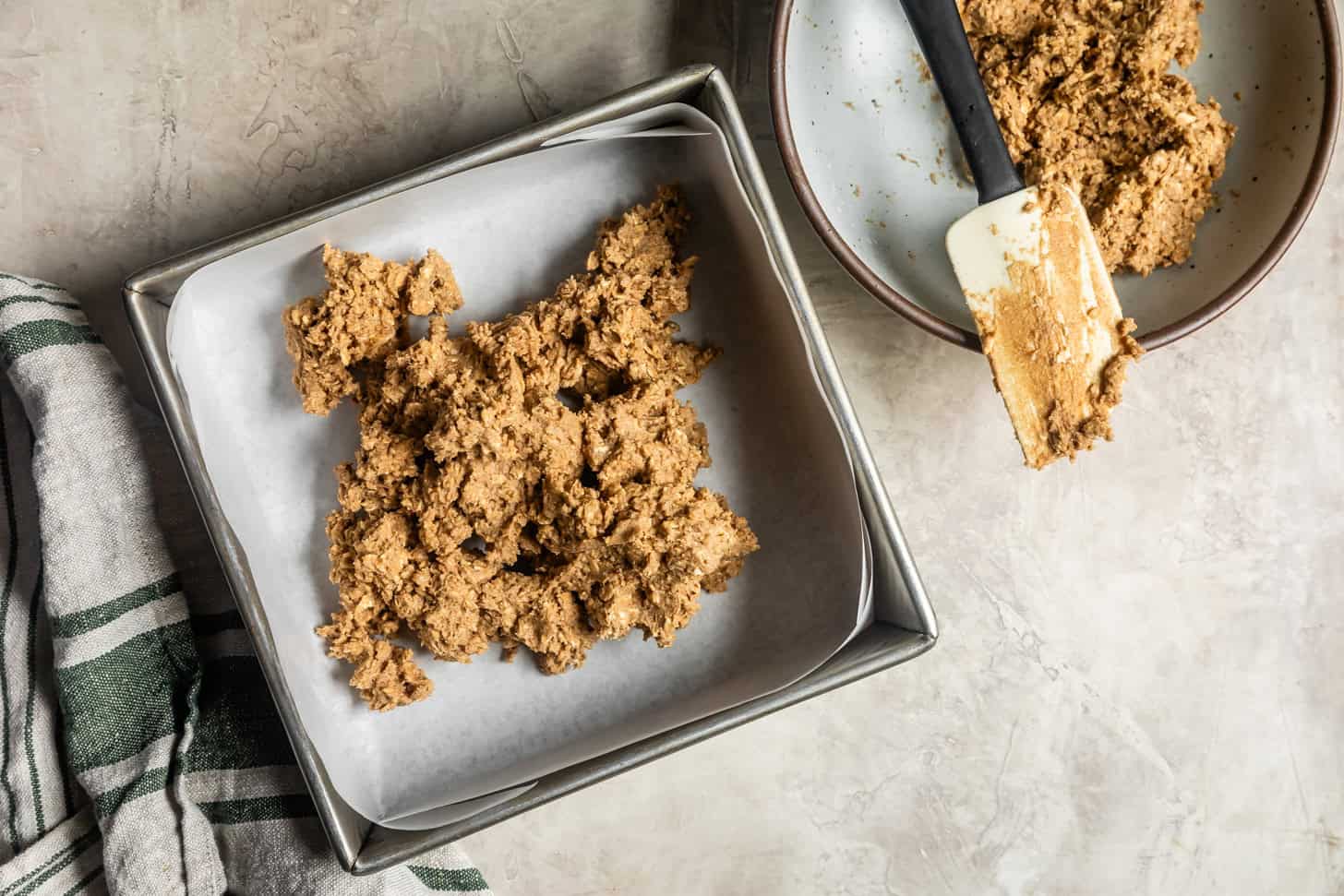 Pressing Dough Into Baking Pan Fig Bars
