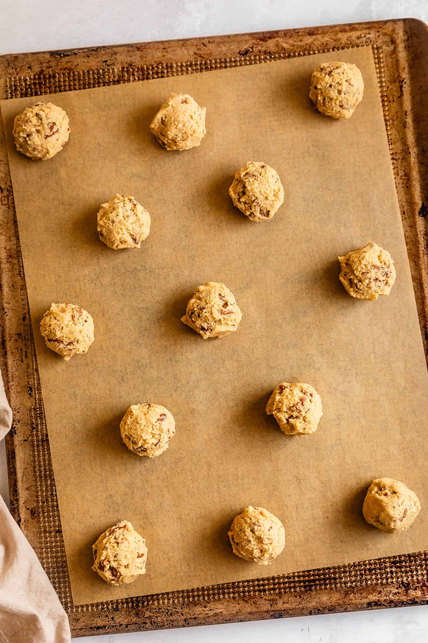 Gluten Free Pecan Cookie Dough Balls on Baking Sheet