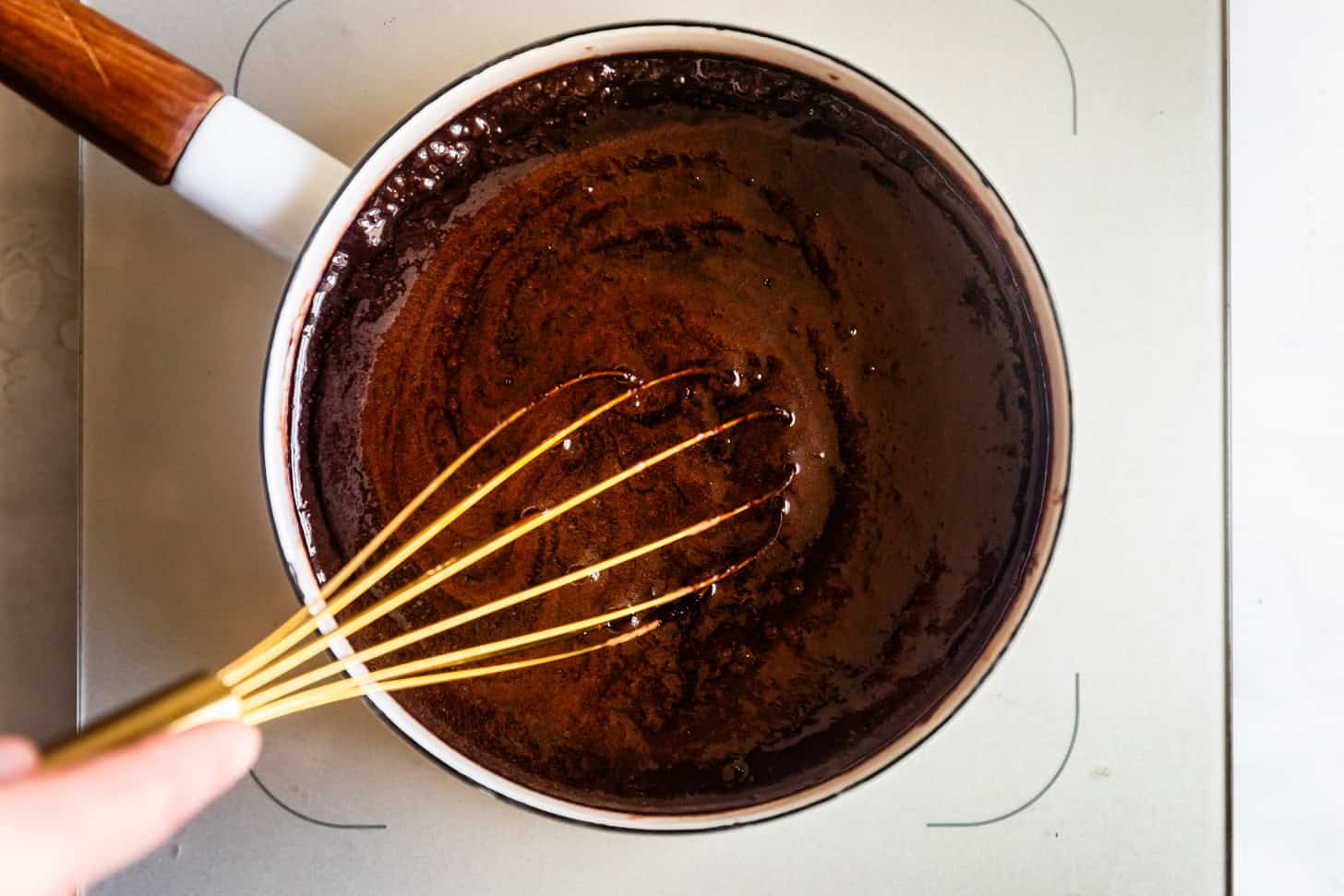 Whisking chocolate mixture for no-bake cookies