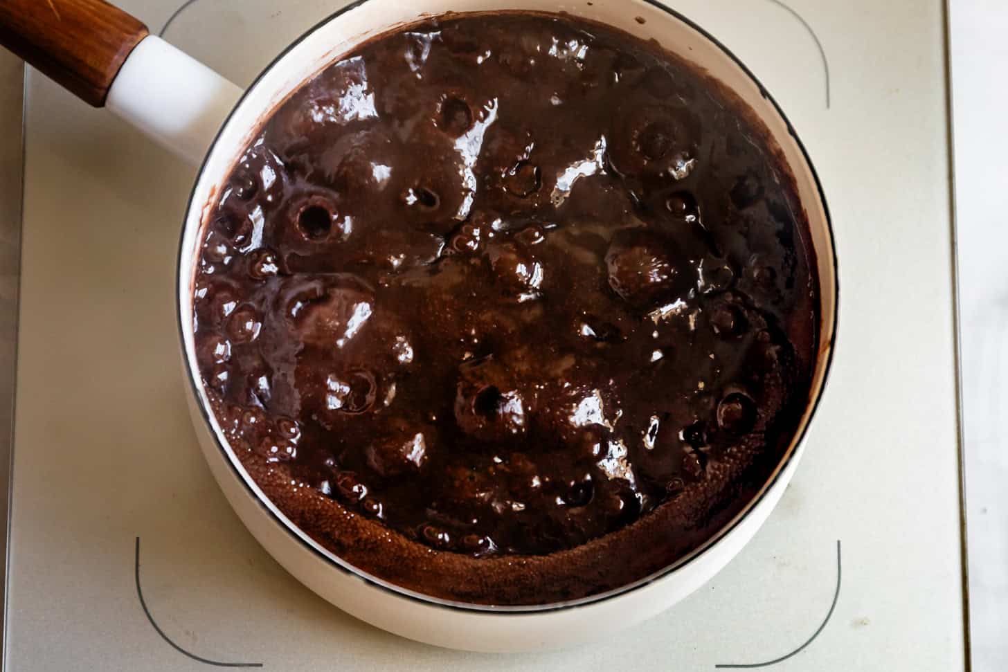 Bringing chocolate mixture to boil for gluten-free no-bake cookies