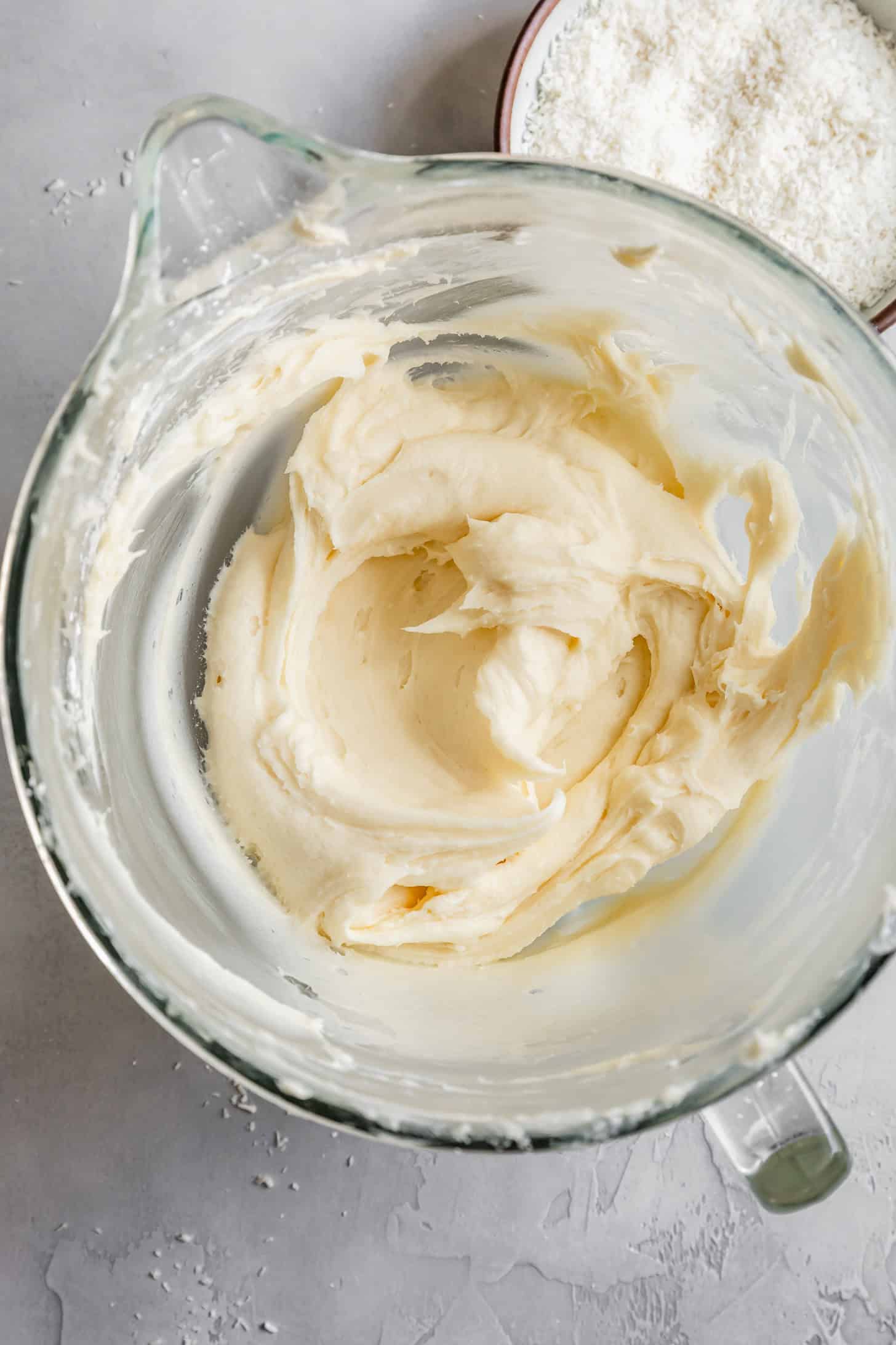 Smooth Coconut Cream Cheese Frosting in Mixing Bowl