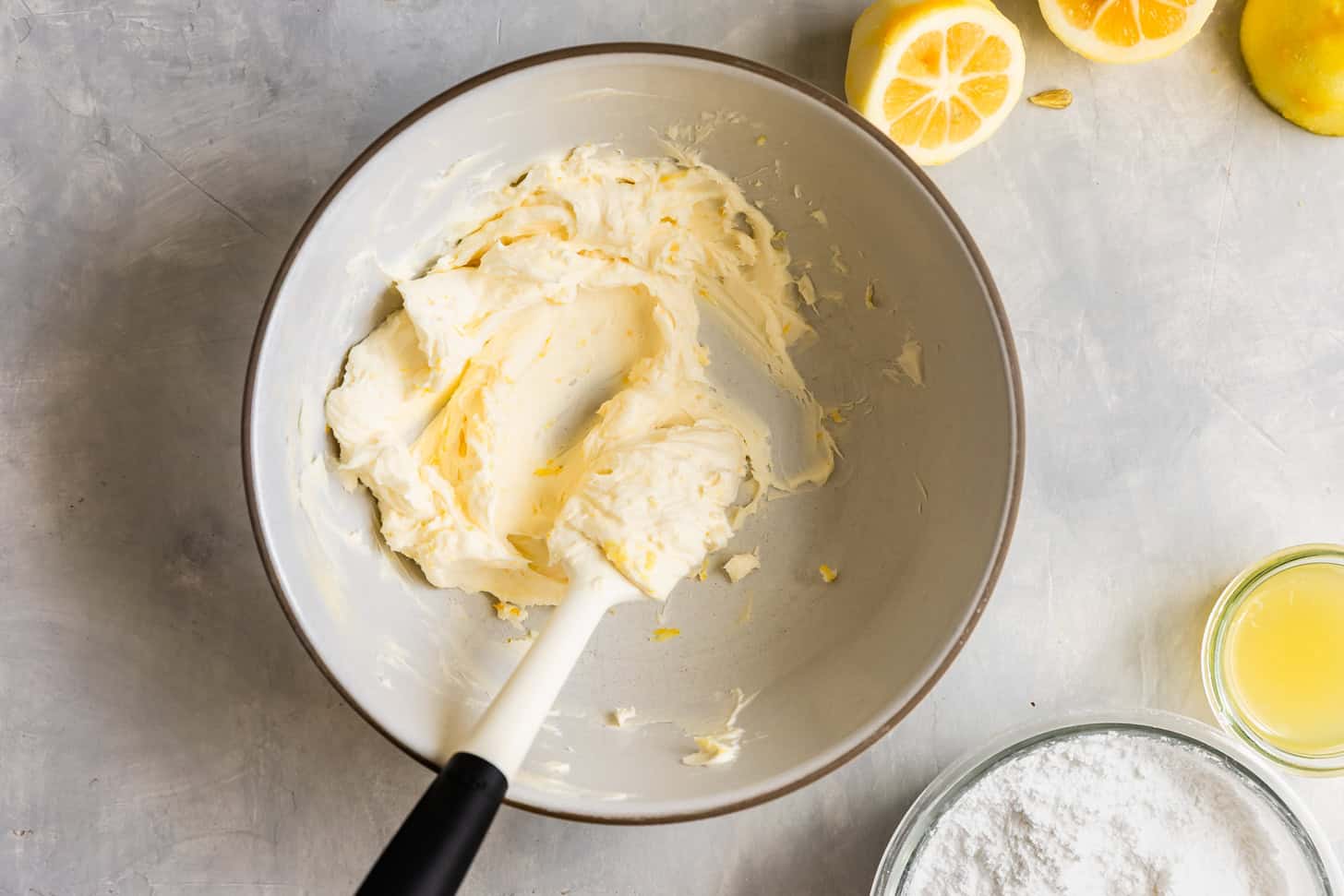 Mash lemon zest into butter and cream cheese
