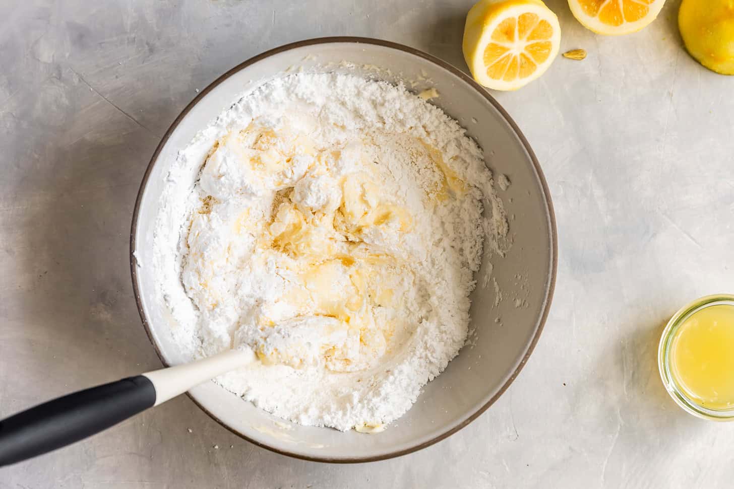 Mix in the powdered sugar in parts until smooth