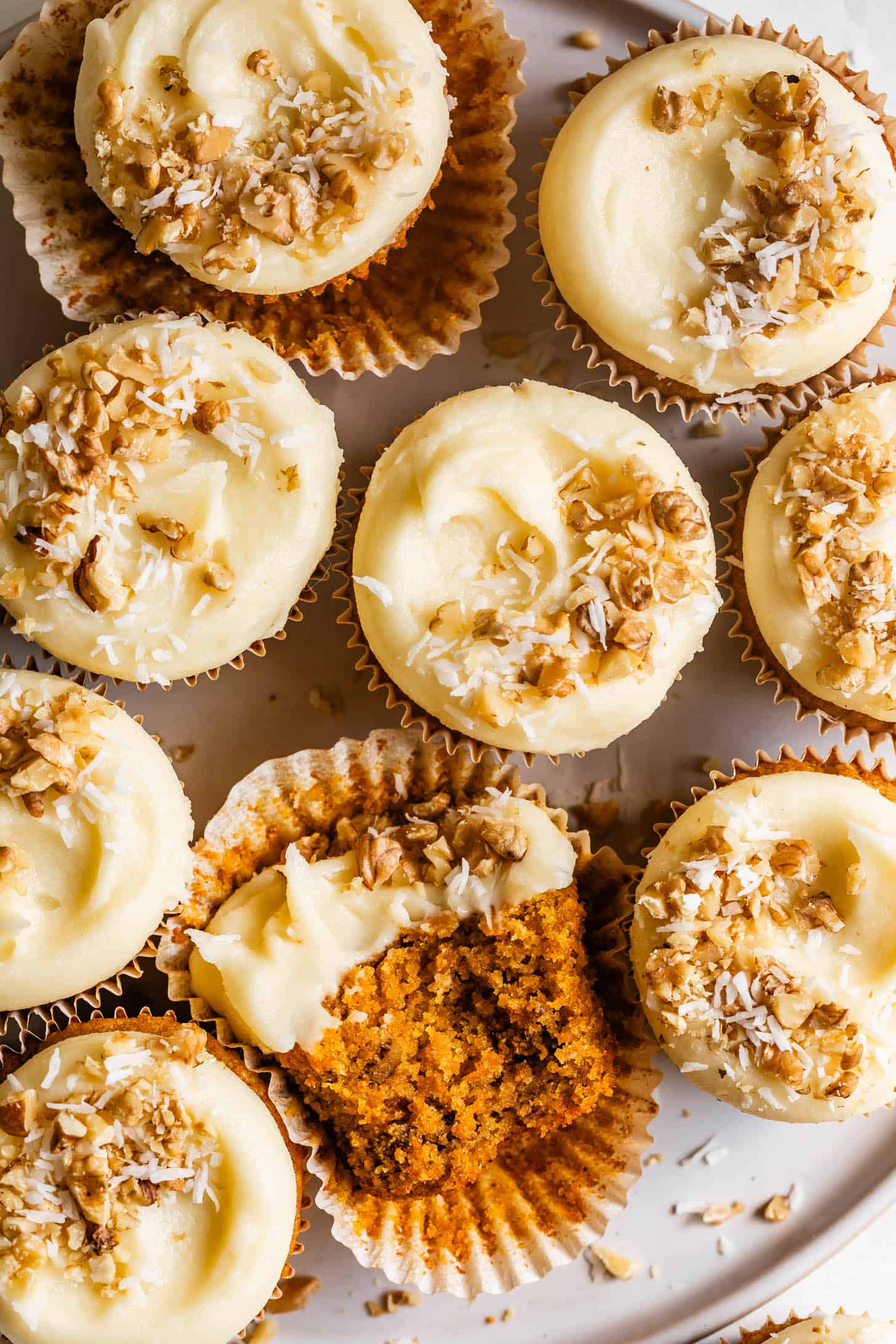 Gluten-Free Carrot Cupcakes Top Down with Bite