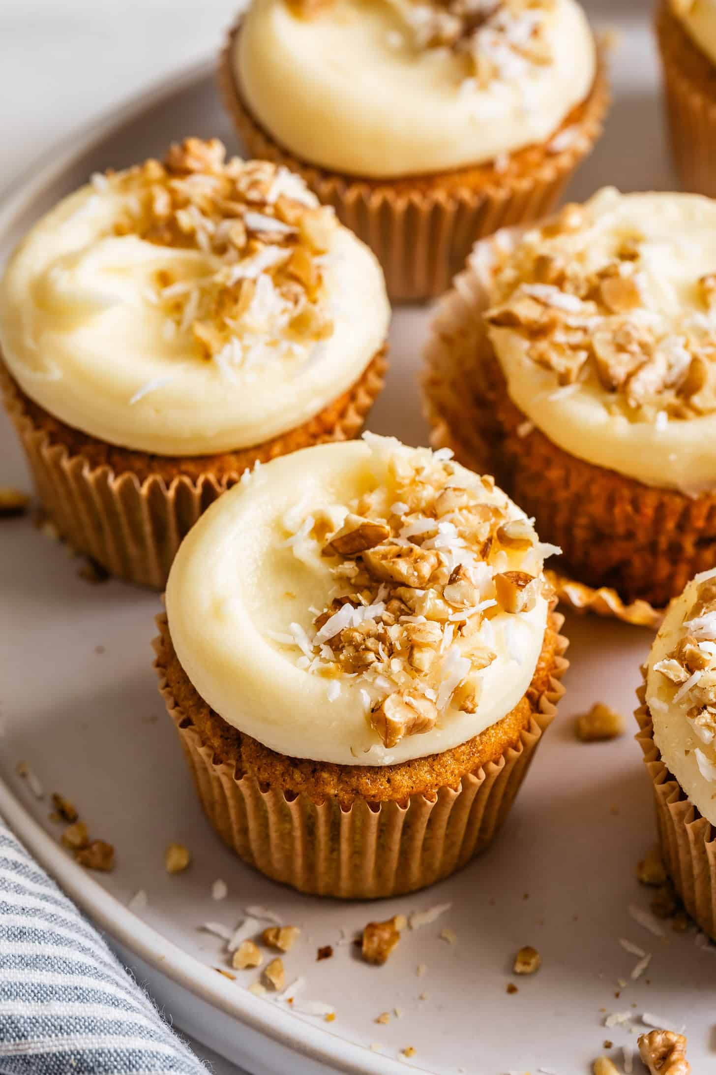 Gluten-Free Carrot Cupcakes with Toasted Walnuts on Plate