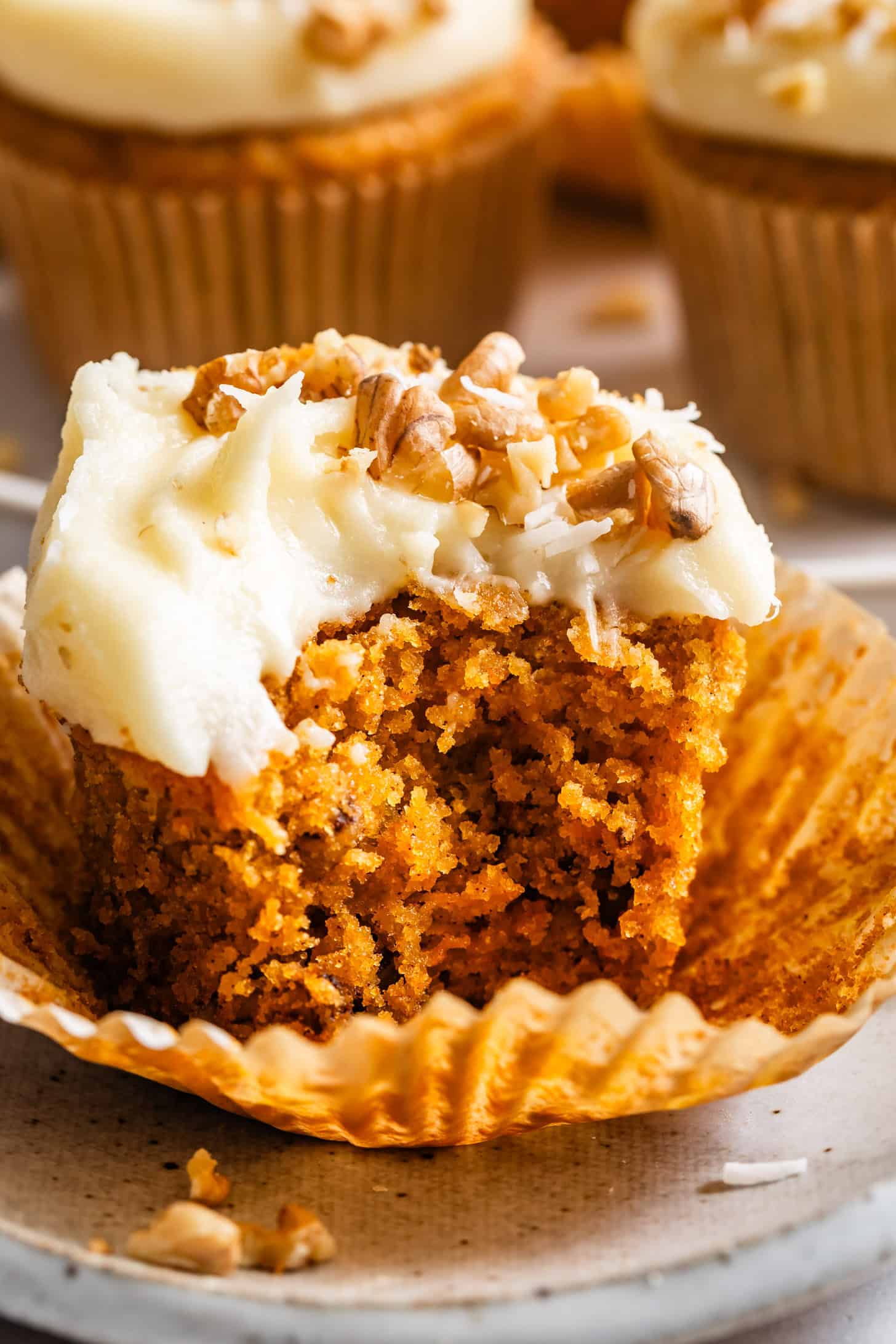 Gluten-Free Carrot Cake Cupcakes with Bite Taken Out